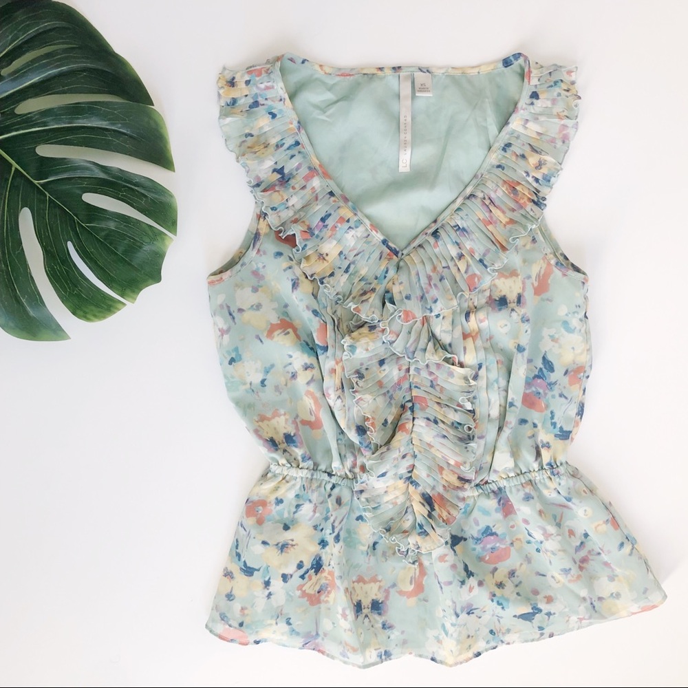 🍍Lauren Conrad floral sleeveless peplum blouse
